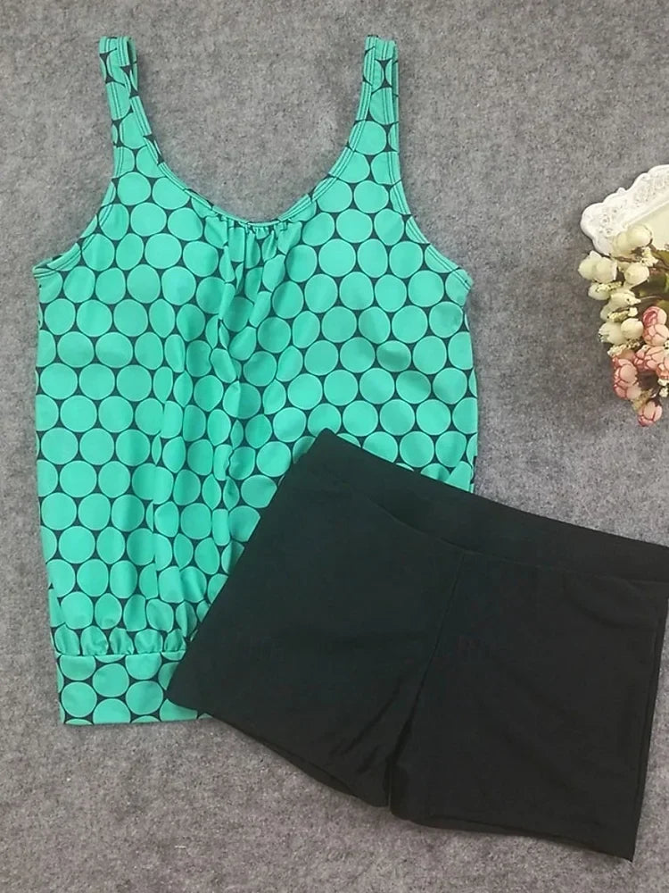 Punto | Ensemble de tankini à pois qui couvre le ventre avec un short de bain