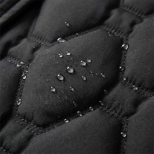Briseida | Long manteau en duvet avec capuche